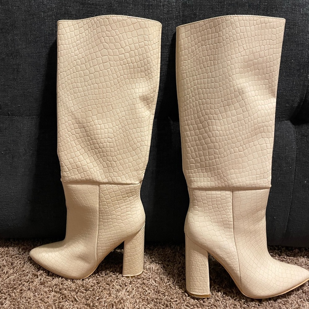 Knee high cream boots